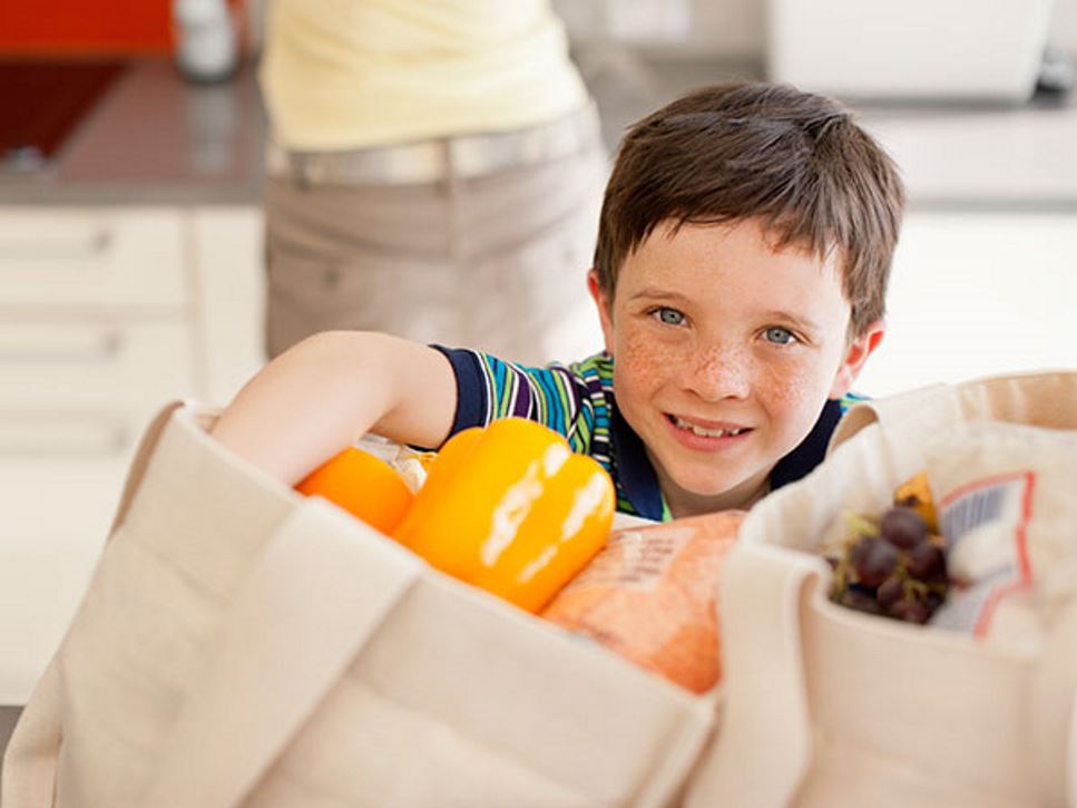 boy with groceries