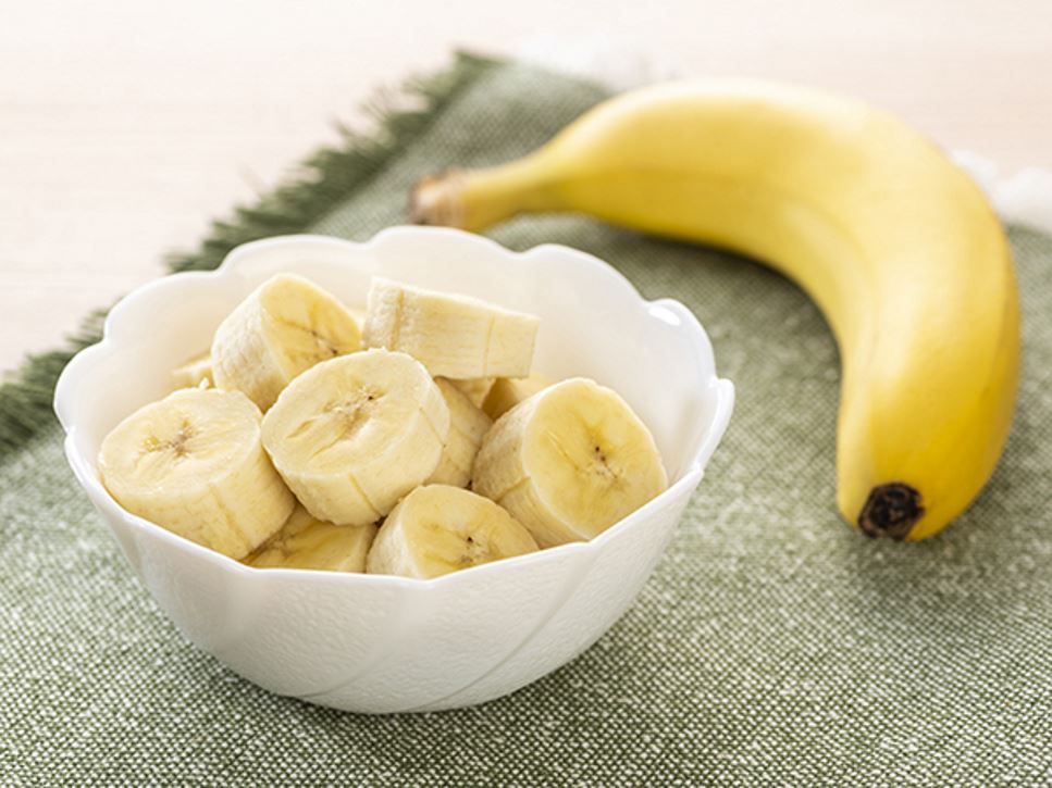 Slices of bananas to be used in a recipe for Go Bananas Parfaits for a snack or dessert.